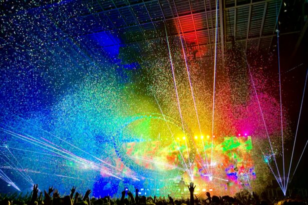 people watching concert with multicolored stage light display